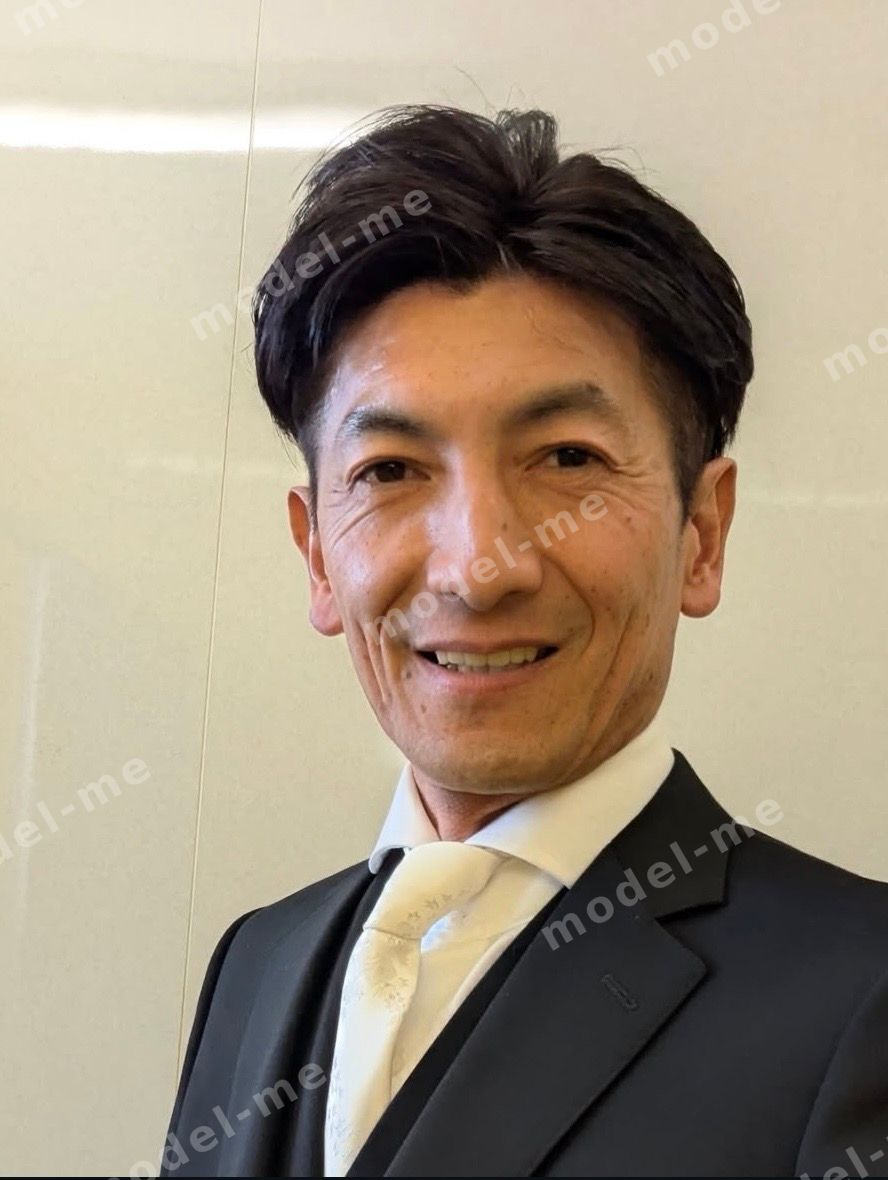 津田貴久